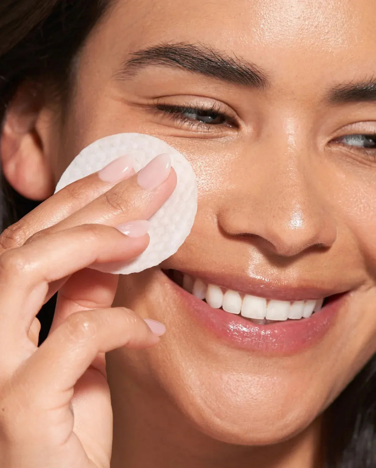 Woman using a Barefaced Toning Pad